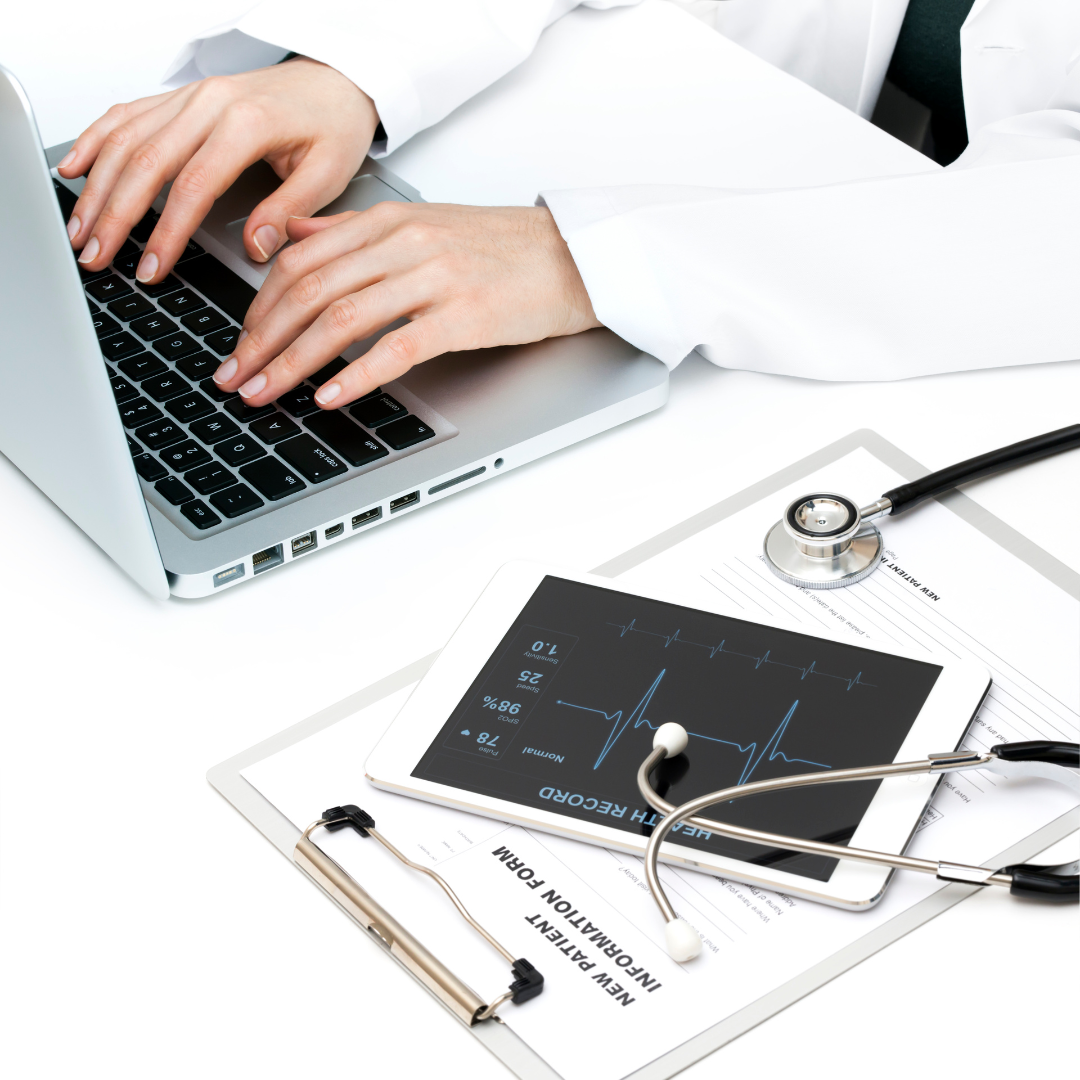 coronis health hospital rcm worker using laptop