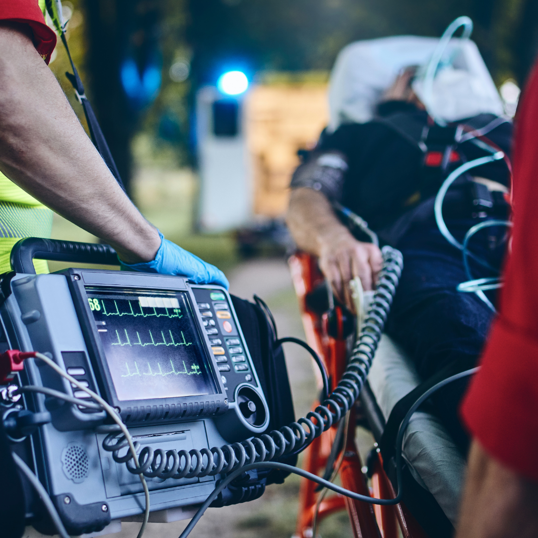 coronis health emergency medical service workers helping patient