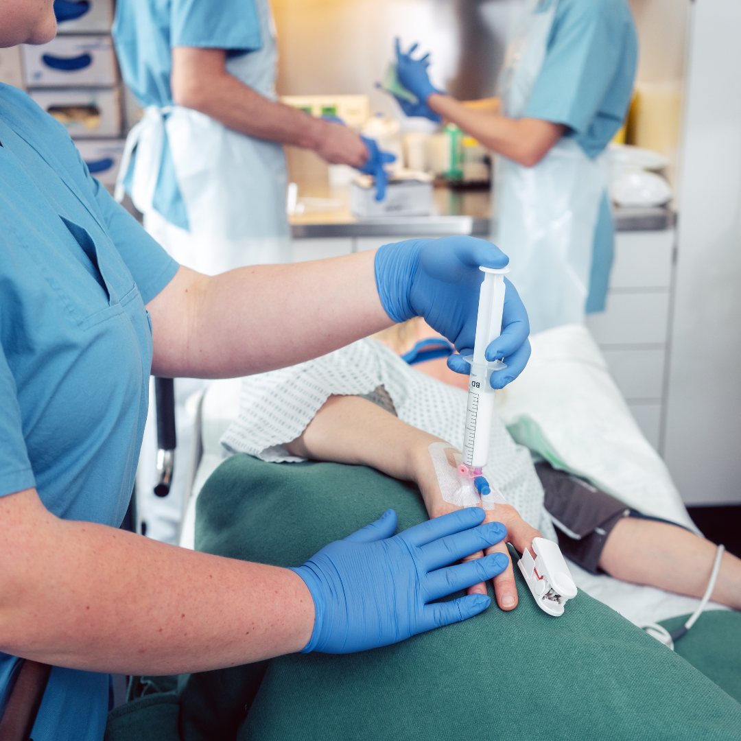 coronis health anesthesia medical worker administering medication to patient