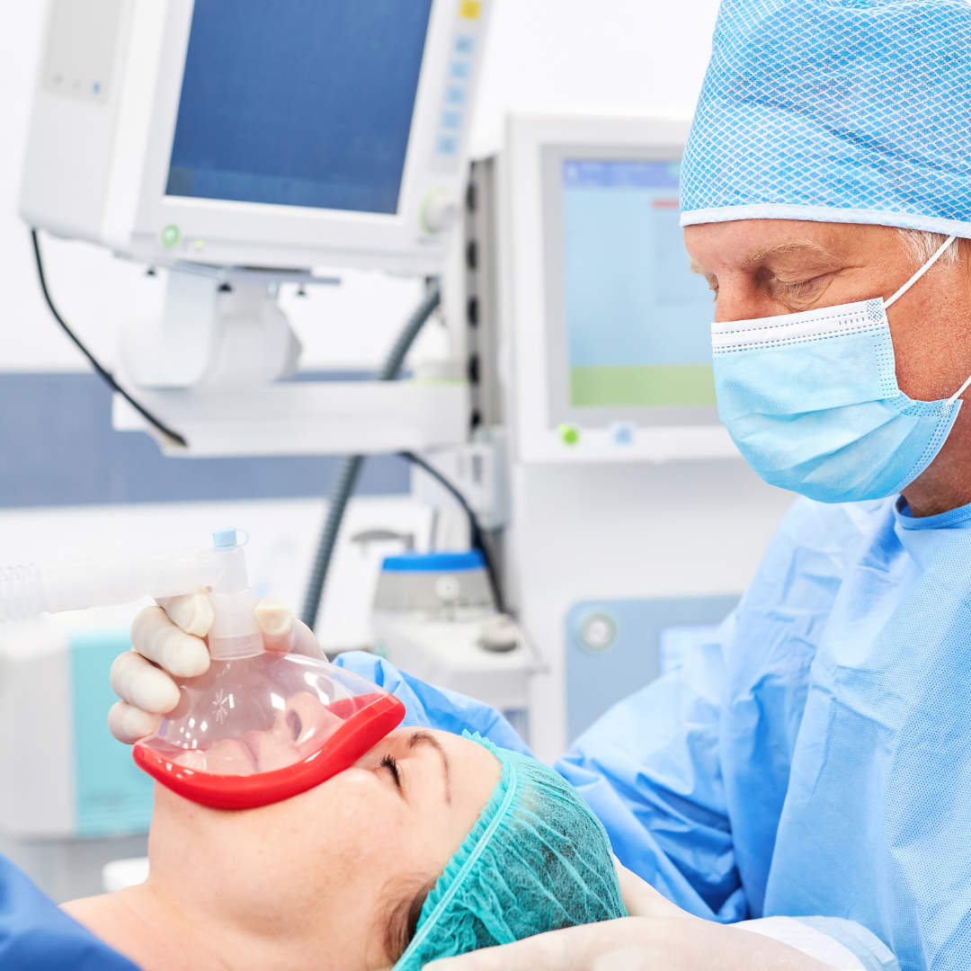 coronis health anesthesiologist administering mask
