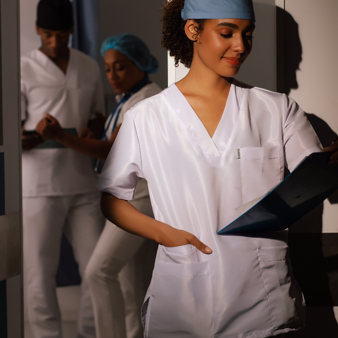 coronis health hospital medical worker looking at chart