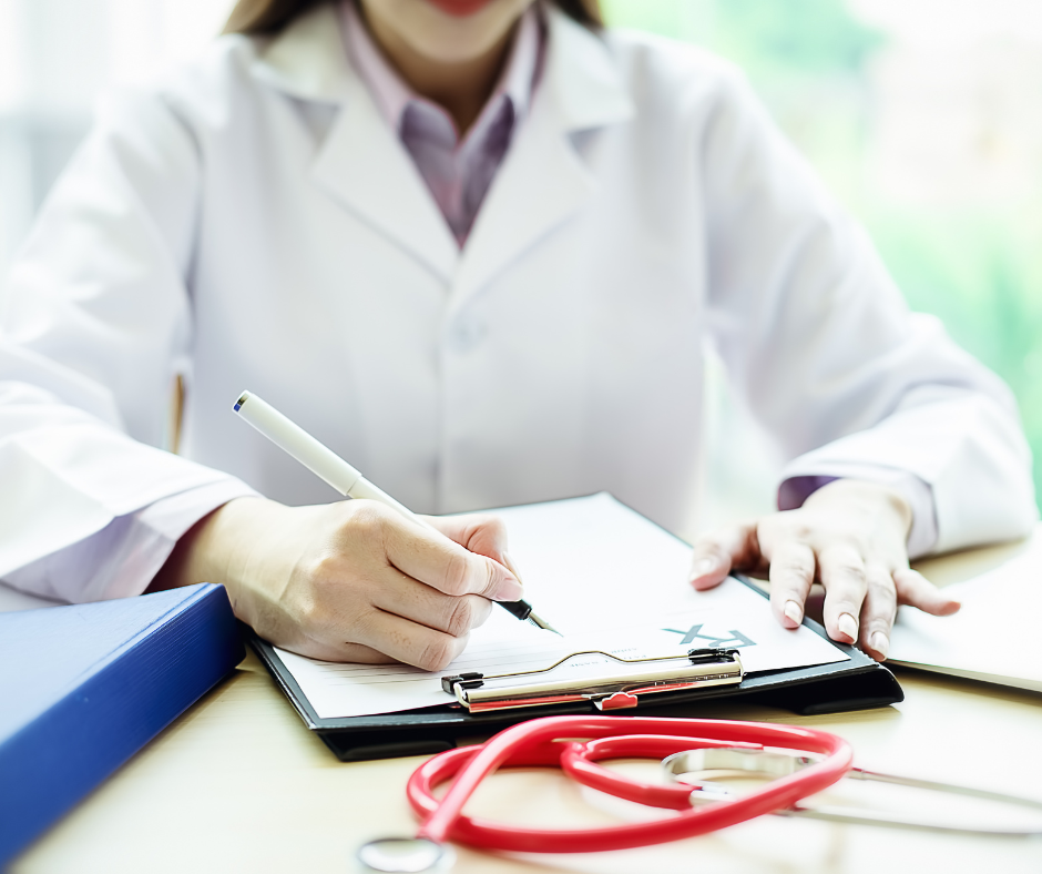 coronis health hospital medical biller writing on clipboard