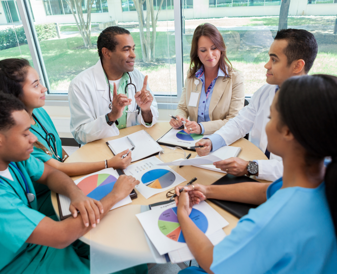 coronis health hospital staff having a meeting