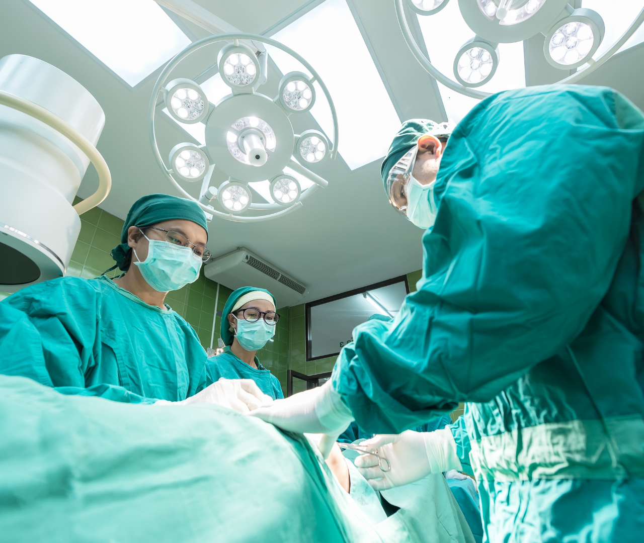 coronis health surgeons operating on a patient in the hospital