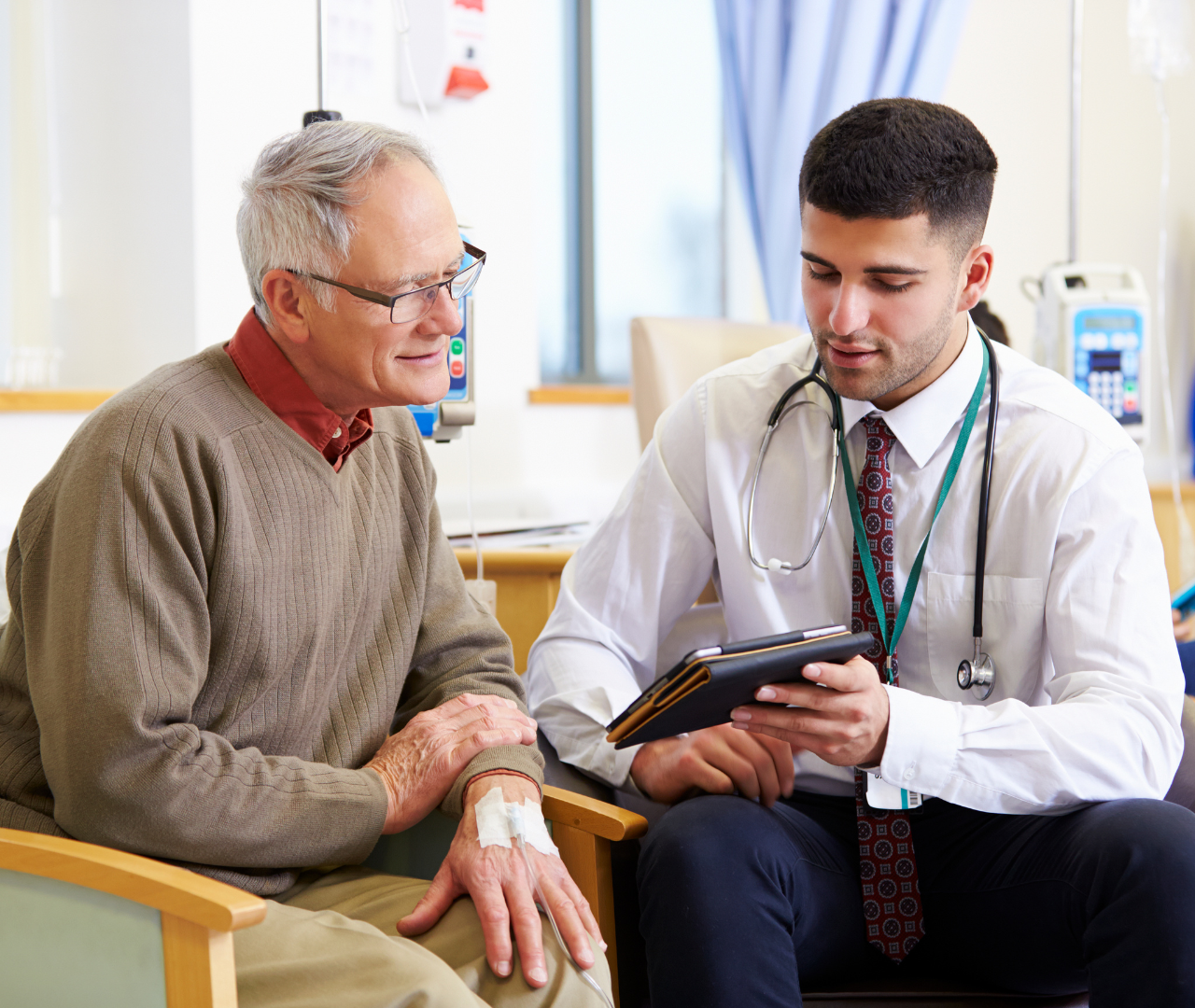 coronis health medical physician consulting with elderly patient