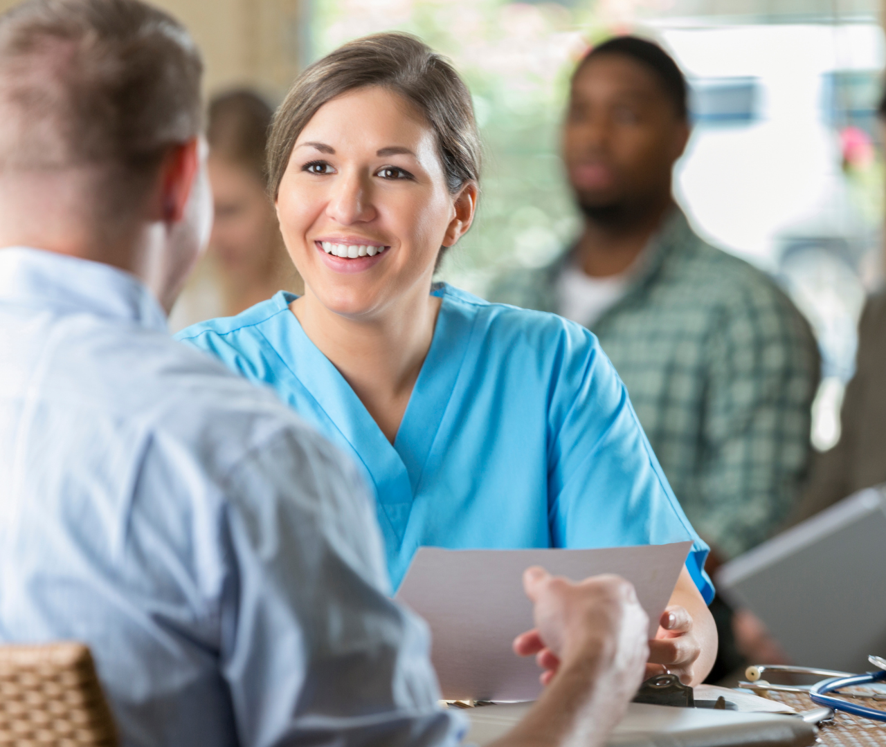 coronis health medical professional discussing business process outsourcing